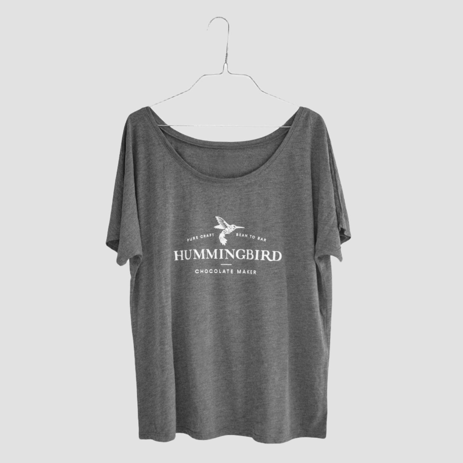 Dark Heather Grey Ladies' Slouchy Scoop-Neck T-Shirt with Hummingbird Chocolate Maker's logo imprinted on the front in center chest position