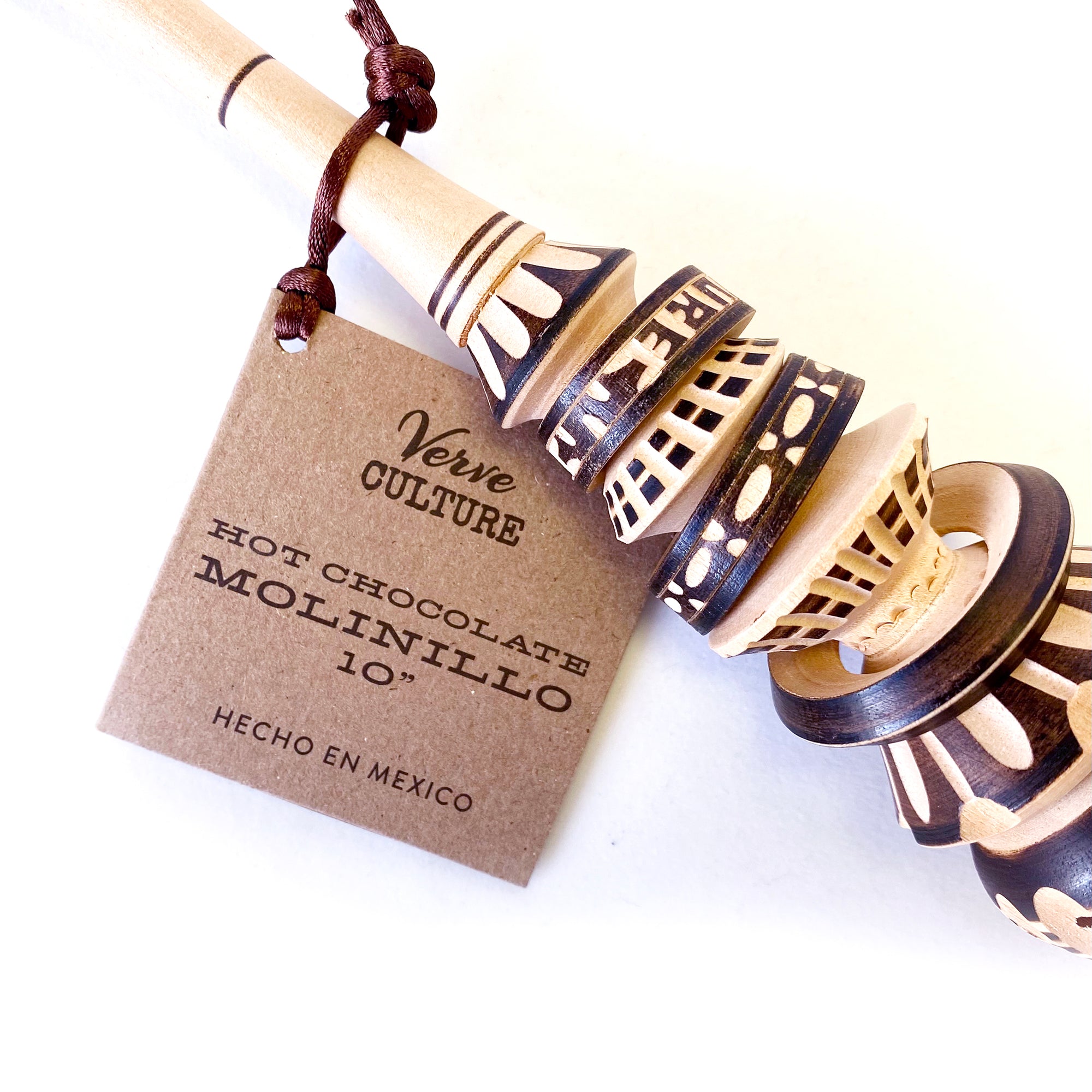 Close up of Hot Chocolate Molinillo, displaying beautiful handcarved and wood burning details. Made in Mexico.