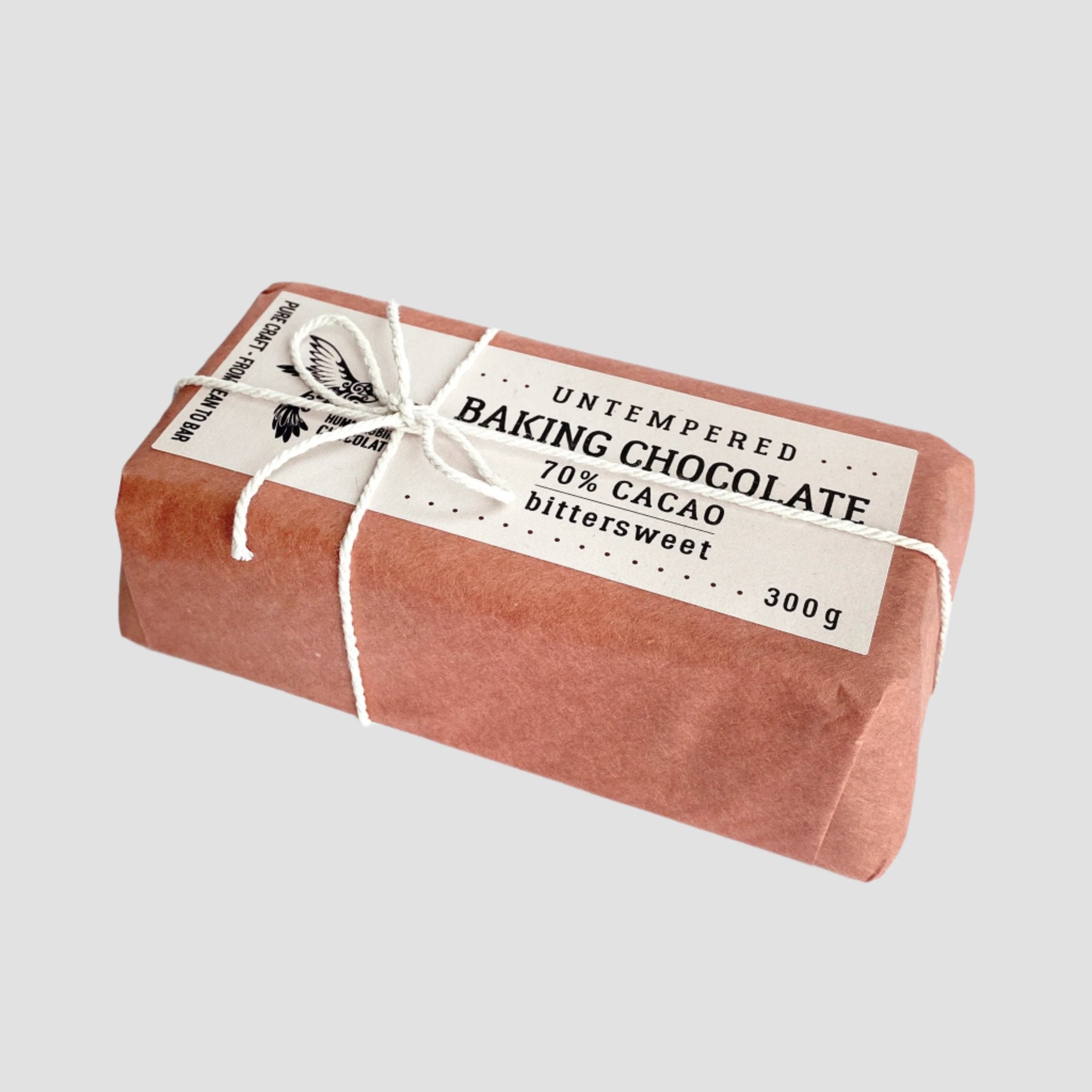 Hummingbird Chocolate, Untempered Baking Chocolate Brick, 70% (bittersweet) Dark chocolate 300g. Wrapped in butchers paper and string.