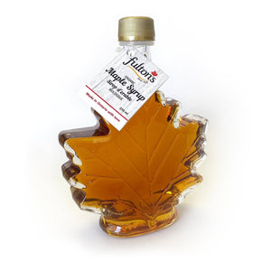 Bottle of Fulton's maple syrup shaped like a maple leaf.