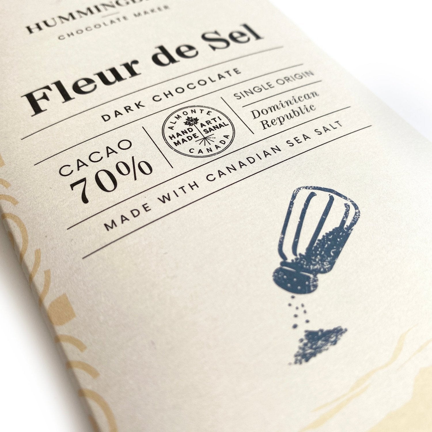 Close up of Fleur de Sel chocolate bar showing bar is made with Canadian sea salt