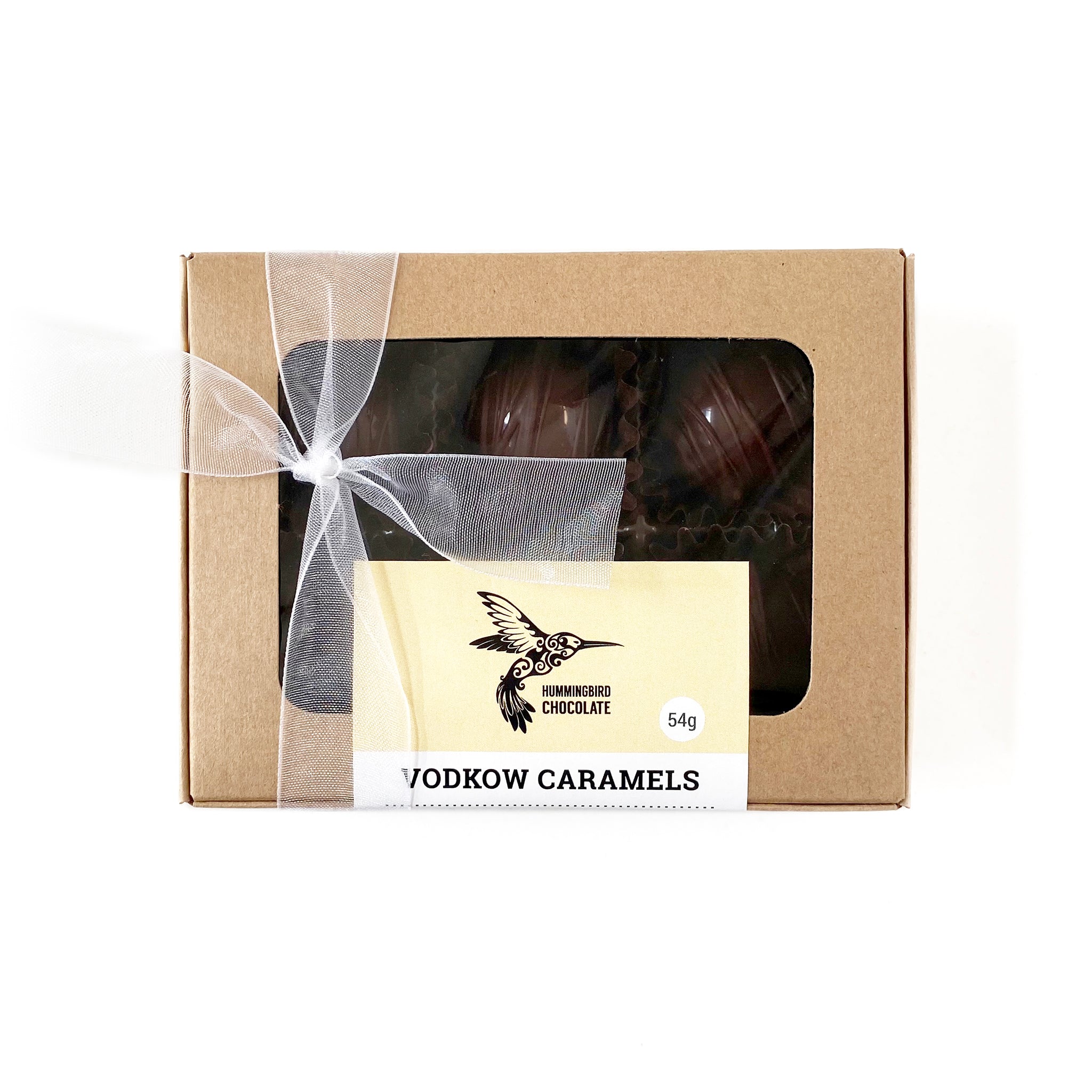 Hummingbird Chocolate Vodkow Caramels, wrapped in a kraft box and white organza bow.