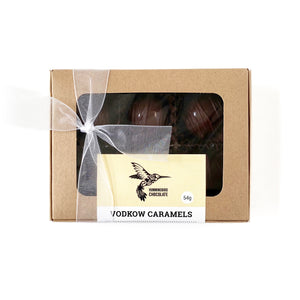 Hummingbird Chocolate Vodkow Caramels, wrapped in a kraft box and white organza bow.